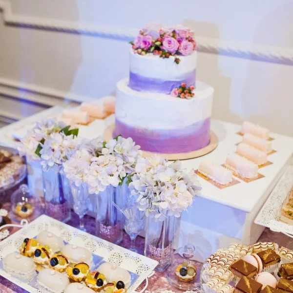 Dessert table of delicious sweets on wedding reception.